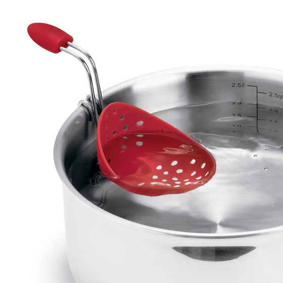 Cuisipro egg silicone poacher set of 2 in red - product image of the egg poacher in a pot of water Danielle Walker